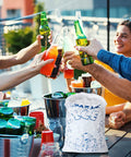 Heavy Duty Ice Bags 10 Lb With Drawstring 50 Count Reusable Ice Bags For Ice Machines visible on a table at an outdoor party
