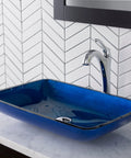 Rectangular Blue Glass Vessel Sink For Bathroom 22 Inch Above Counter Design Scratch Resistant And Easy Clean Interior Coordinates With Wall Mount Or Vessel Faucets For A Sleek Dope Modern Look displayed on a countertop.