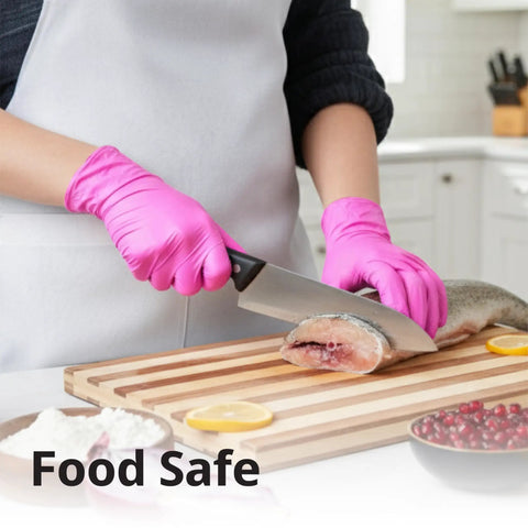 Top Tier Disposable Nitrile Gloves In Bright Fuchsia, Powder Free Latex Free, 3 Mil Flexible Grip For Kitchen Cleaning And Beauty Tasks, 100 Count Lowkey Essential Pick being used while preparing food.