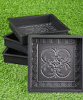 4 Piece Concrete Molds Set For DIY Paving Big Pathmaker Cobblestone Molds stacked on artificial grass surface