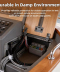 Waterproof 12V Fuse And Relay Box With 12 ATC ATO Fuses And Four Relay Slots Prewired Harness installed in a boat's control panel.