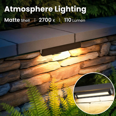 Dope LED Retaining Wall Lighting Kit illuminating stone wall in 2700K warm white with matte shell, 110 lumens output.