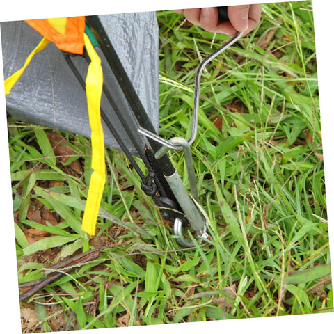 Close-up of All In One Heavy Duty Tent Stake Puller Tool Set for Camping and Outdoor Use Peg Remover and Hook Extractor in action
