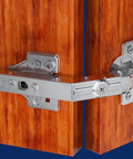 Smooth Operator 135 Degree Lazy Susan Hinges for Corner Cabinets, shown on wooden cupboard panels, featuring a concealed clip-on plate.