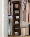 Slick 6 Tier Narrow Closet Organizer In Classic Amber Pine with folded clothes and storage boxes in a closet.