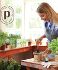 Woman gardening with 9 Herb Indoor Window Garden Kit With Seed Starter For Fresh Homegrown Herbs, Easy To Grow In Kitchen
