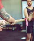 Participants pulling Natural Jute Rope 1.5 Inch Diameter 50 Feet Long Four Strand Heavy Duty during a tug of war competition.