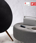 18 Piece Electric Screwdriver Tool Kit With LED Light 3 Torque Settings on ottoman next to modern black speaker
