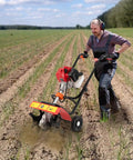 Man using 52cc Gas Powered Tiller Cultivator for Backyard Garden and Lawn, Tiny But Mighty Mini Rototiller in field