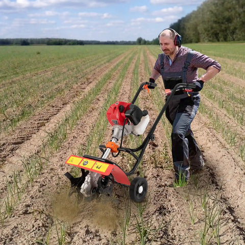 Man using 52cc Gas Powered Tiller Cultivator for Backyard Garden and Lawn, Tiny But Mighty Mini Rototiller in field