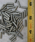 Stainless Dowel Pins for Interference Fit One Eighth Inch Outer Diameter and Half Inch Length Pack of Twenty Seven Hardware Fastener Set for Multi Purpose Projects Built To Last Corrosion Resistant for Harsh Environments and High Humidity, stainless pins beside ruler
