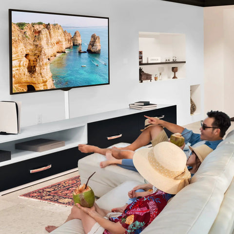 Family watching TV with TV Cord Hider 39 Inch Wall Cable Concealer Kit for Wall Mounted TVs, cables hidden from view