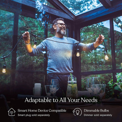 Person installing Dope Outdoor String Lights 48 Ft With 15 Dimmable Edison Bulbs 11W Waterproof Commercial Grade Patio Lights in a glass patio.