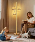 Industrial Style Tree Floor Lamp With Stepless Dimmable Brightness 68 Inch Tall Standing Light For Living Room Bedroom Office E26 Socket 3 LED Bulbs Included Black Finish, in cozy living room scene with mother reading and child drawing