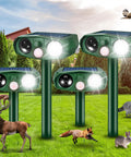 Ultrasonic Outdoor Animal Deterrent With Motion Sensor For Cats Squirrels And Other Critters Solar Powered Yard Shield Garden Repellent Waterproof Pest Defense Stake 110 Degree PIR Wide Angle Two Modes With Or Without Flashing Lights in garden setting with animals.