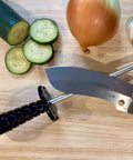 12-Inch Diamond Steel Sharpener DS2E With Extra Fine Grit For Regular Honing And Final Polishing next to vegetables on a table