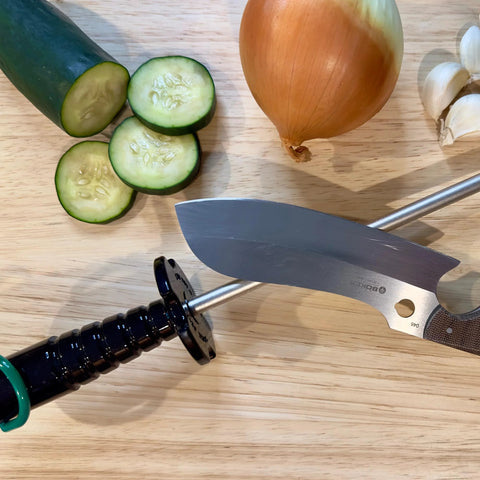 12-Inch Diamond Steel Sharpener DS2E With Extra Fine Grit For Regular Honing And Final Polishing next to vegetables on a table
