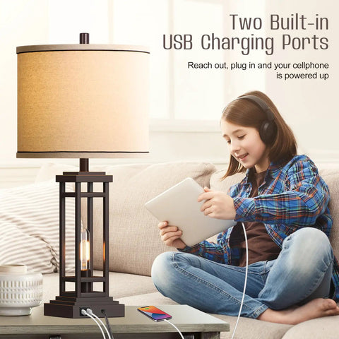 27.5 Inch Tall Farmhouse Table Lamps Set Of 2 With USB C And USB A Charging Ports Rustic Industrial Black End Table Lamps For Bedroom Living Room Nightstand Oil Rubbed Bronze Finish shown with a young person charging devices.