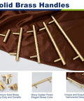 Solid Brass Kitchen Cabinet Pulls Set of 6 in Polished Gold with Hammered T-Bar Handles displayed on fabric
