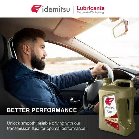 Man driving with ATF Type HK Automatic Transmission Fluid For Hyundai And Kia SP III Spec 5 Quart Bottle on dashboard