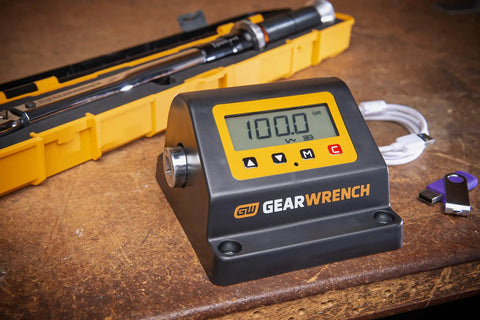 Torque Tester Bench Top Half Inch Drive 10 To 100 Foot Pounds 13.6 To 135.6 Newton Meters Four Readouts Inch Pounds Foot Pounds Newton Meters And Kilogram Centimeters Accuracy Plus Or Minus One Percent Model 89633 digital torque tester on workbench