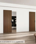 42 By 84 Inch Concealed Sliding Barn Door With Soft Close Mechanism And Heavy Duty Track System shown in modern space setting.