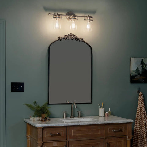Brinley 24-Inch Three-Light Vanity Light In Brushed Nickel With Clear Glass Farmhouse Chic Bathroom Fixture Sits Above Mirror