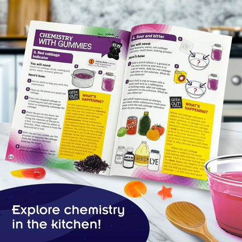 Open instruction booklet and space-themed gummies from Space Gummy Candy Lab STEM Experiment Kit For Kids Make Space Themed Gummy Pops And Candies Explore Chemistry In Cooking Safe To Eat Made In USA Food Ingredients Included Up To 72 Gummies.