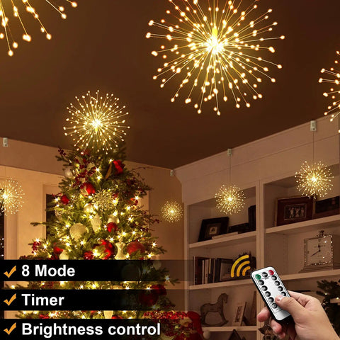 Lit 200 LED Copper Wire Starburst Fairy Lights with remote in ceiling decor, warm white glow, Christmas setting