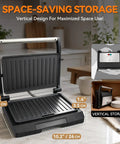 Premium Baker's Friend Mini Panini Press Electric Grill showing vertical design and nonstick plates for space-saving storage.