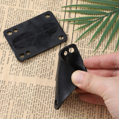 One Eighth Inch Rubber Skateboard Riser Pads With Mounting Screws And Nuts, Wheelbite Prevention And Shock Absorption displayed on paper