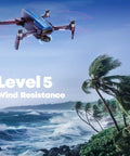 Beast Of A Drone With 8K Photos And 4K Video, 3-Axis Gimbal flying over ocean showing level 5 wind resistance, palm trees in breeze.