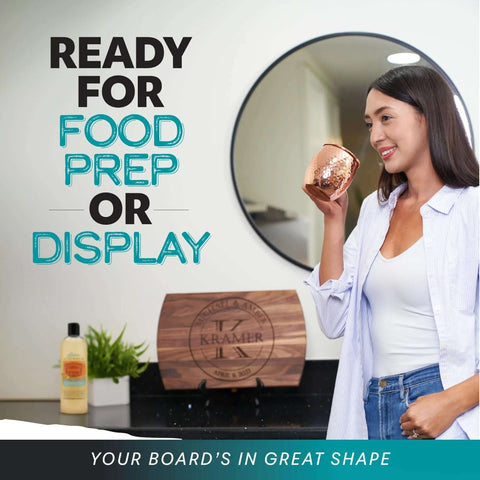 Wood cutting board with circular engraving on a display stand on a kitchen counter