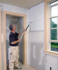 Man applying Durable Satin White Interior Paint That Sticks To Walls Without Sanding, Washable And Scrubbable Finish For Walls And Trim