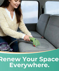 Woman using Replacement 3 Inch Heavy Duty Grime Busting Stain Brush Head for portable carpet and upholstery cleaners on sofa.