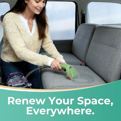 Woman using Replacement 3 Inch Heavy Duty Grime Busting Stain Brush Head for portable carpet and upholstery cleaners on sofa.