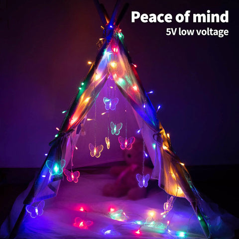 Butterfly Curtain Lights 13ft 96 LED Fairy String With Remote 8 Modes Multicolor illuminating a tent with butterflies.