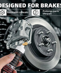 Copper anti-seize lubricant bottle close-up being applied to car brake caliper hardware