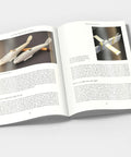 Open book showing WWI aircraft models in 1/144 scale, techniques for scratchbuilding from 'Hands On Scratchbuilding World War I Aircraft In 1 144 Scale A Practical Guide For Diehard Modelers Featuring Nitty Gritty Plans And Tips For The Royal Aircraft Factory FE 2B Airco DH 2 Pfalz D III For Builders Everywhere.'