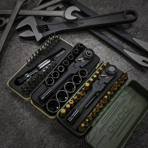 Open boxes of Torx Bit Set 77-Piece with 2 in 1 ratchet magnetic bit holder, showing sockets and bits on a textured surface.