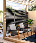 Metal Outdoor Privacy Screen 72 Inch By 49 Inch Freestanding Privacy Fence Panels Decor for patio with chairs and table