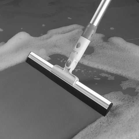Heavy Duty Floor Squeegee With Flexible Silicone Blade And Long Aluminum Handle For Streak Free Bathrooms Showers Tiles Driveways And Glass That Makes Mopping Obsolete Now on wet surface.