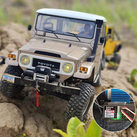 RC car with 2.4GHz R6F 6 Channel RC Receiver For Long Distance Control Of Cars and Boats; focus on receiver installation.