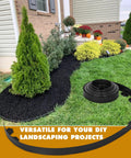 Heavy Duty Black Landscape Edging 2 Inches Tall 33 Feet Long All In One Kit with 30 Anchoring Spikes and 5 Connectors installed in garden