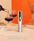 Cordless Electric Wine Opener With Automatic Cork Extractor And Precision Foil Cutter With Rechargeable Base on table with wine and glasses.