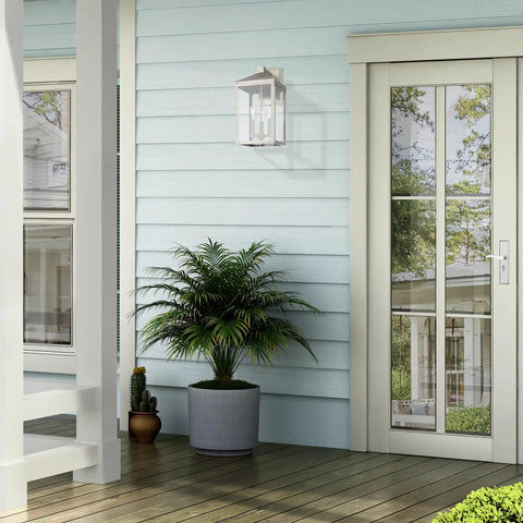 Transitional Three Light Outdoor Wall Lantern From Nyack Collection in brushed nickel finish on a porch wall