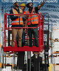 Front view of a red 36x36-inch foldable forklift safety cage with rails, carrying 3 workers in orange vests inside, warehouse background.