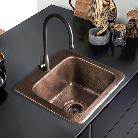 15-Inch Baxter Drop-In Pure Copper Bar Sink With Hand-Hammered Finish installed in a modern kitchen countertop