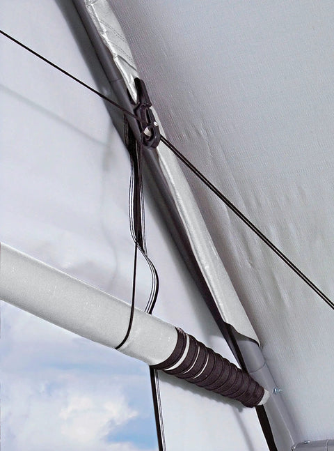 Close-up of Pull-Eaze Roll Up Door Kit for Shelters With Easy One Pull Access showing steel pocket pipe and nylon rope pulley system.