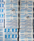 Straight Up Heavy Duty R30 Kraft Paper Faced Fiberglass Batt Insulation For 2x8 Floors And Attics Eight Large Bags stacked on pallets.